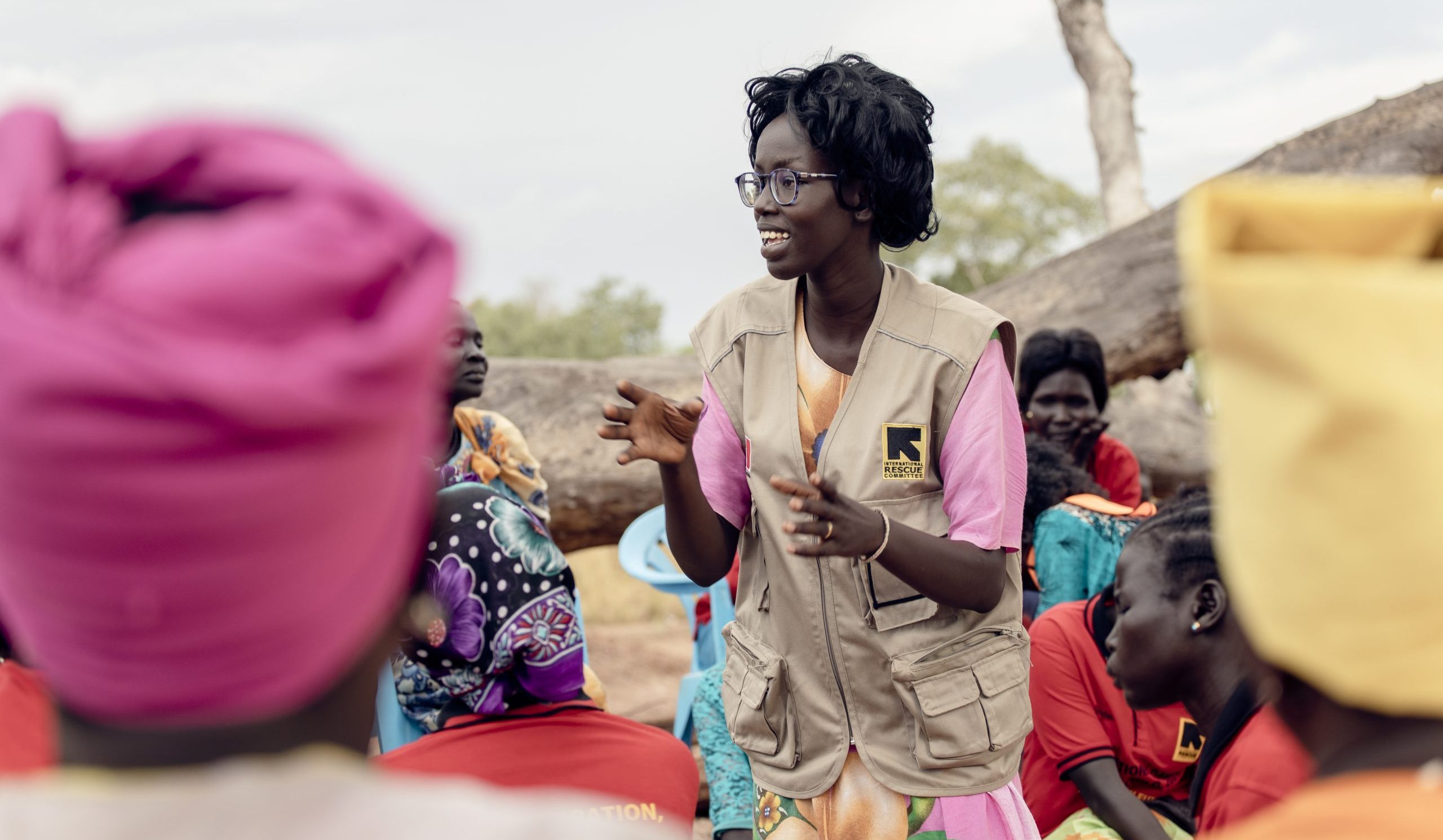 Tabetha, an IRC WPE case manager, animates the women during a "coffee, tea and talk" session at the Women and Girls Safe space in Jamjang, South Sudan, Monday, Oct. 11, 2021. Image courtesy of the International Rescue Committee.